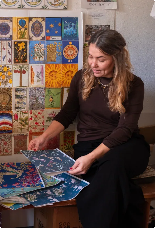 Designer working with color samples and wall layouts