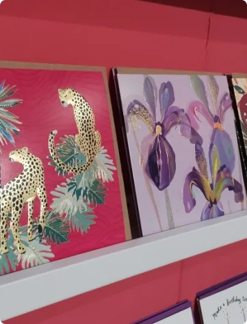 Leopard and floral art prints on display
